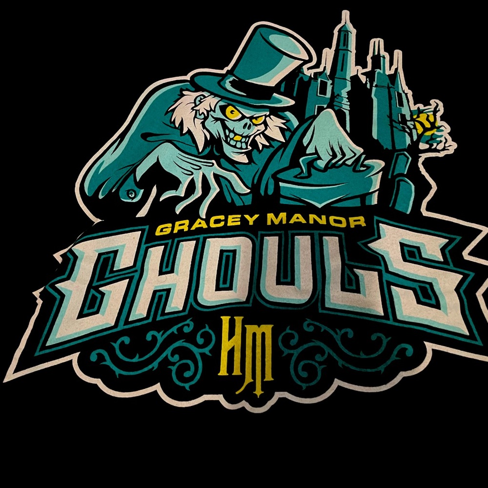 The Haunted Mansion XL Gracey Manor Ghouls on front, 999 on back. Hatbox ghosts.